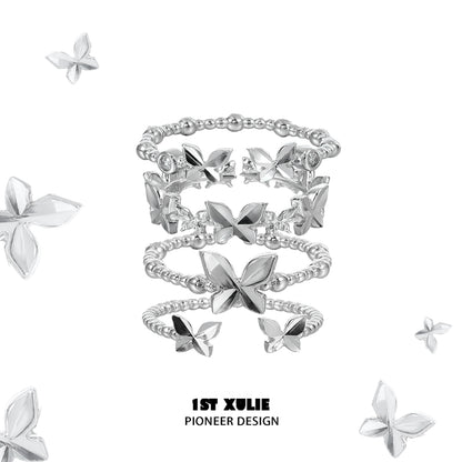Punk butterfly silver ring stack featuring unique designs and elegant butterfly motifs