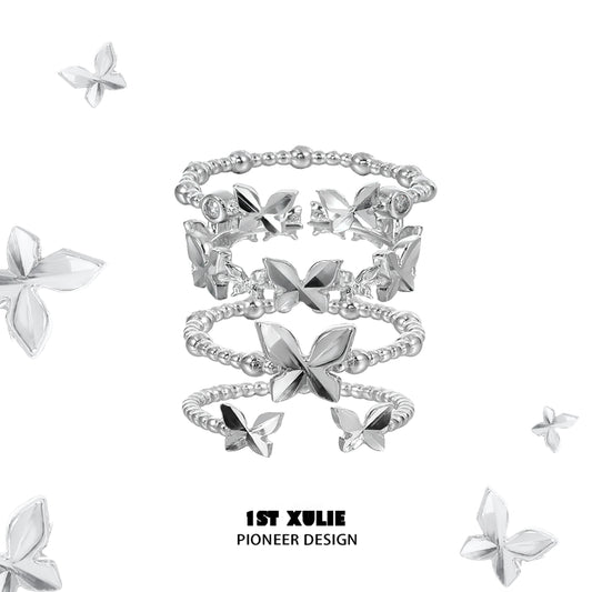 Punk butterfly silver ring stack featuring unique designs and elegant butterfly motifs