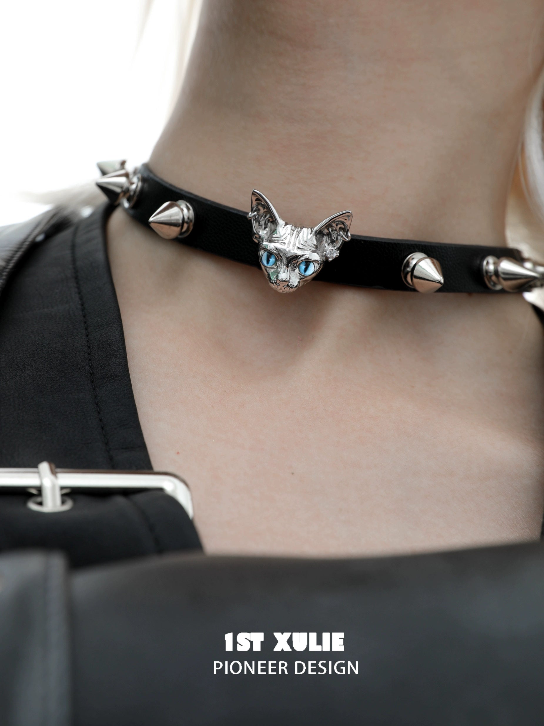 Punk cat studded choker with silver cat head and spiked accents for a bold accessory look