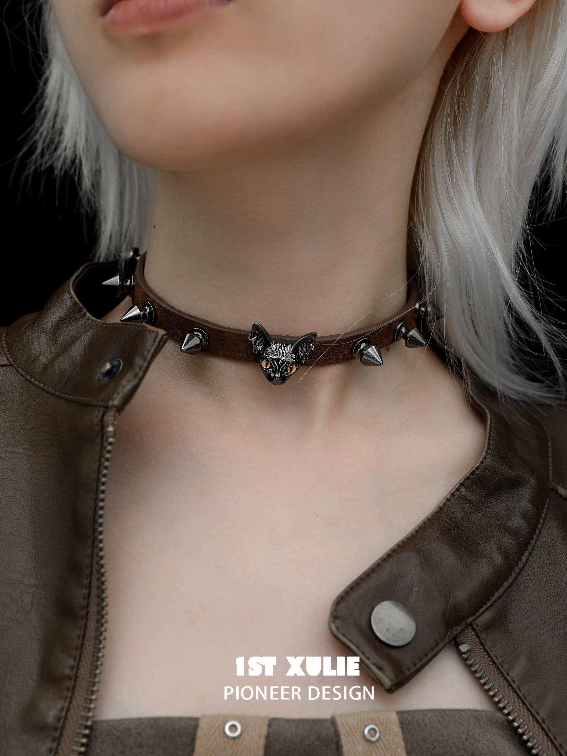 Punk cat studded choker from 1ST XULIE featuring a cat design and spike embellishments