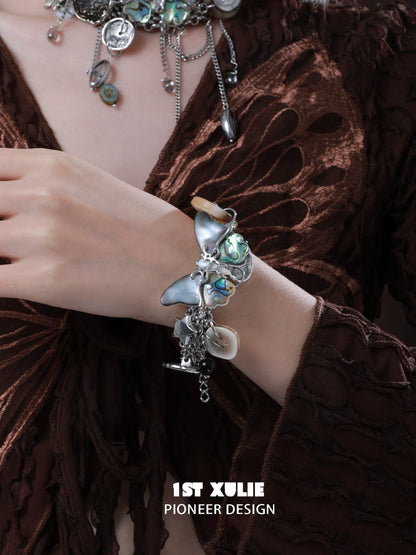 Retro punk butterfly bracelet by 1STXULIE featuring unique butterfly charms and metal details