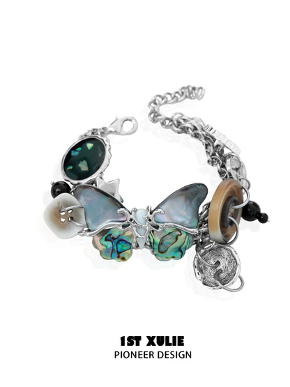 1ST XULIE retro punk butterfly bracelet featuring colorful butterfly charms and unique gemstones