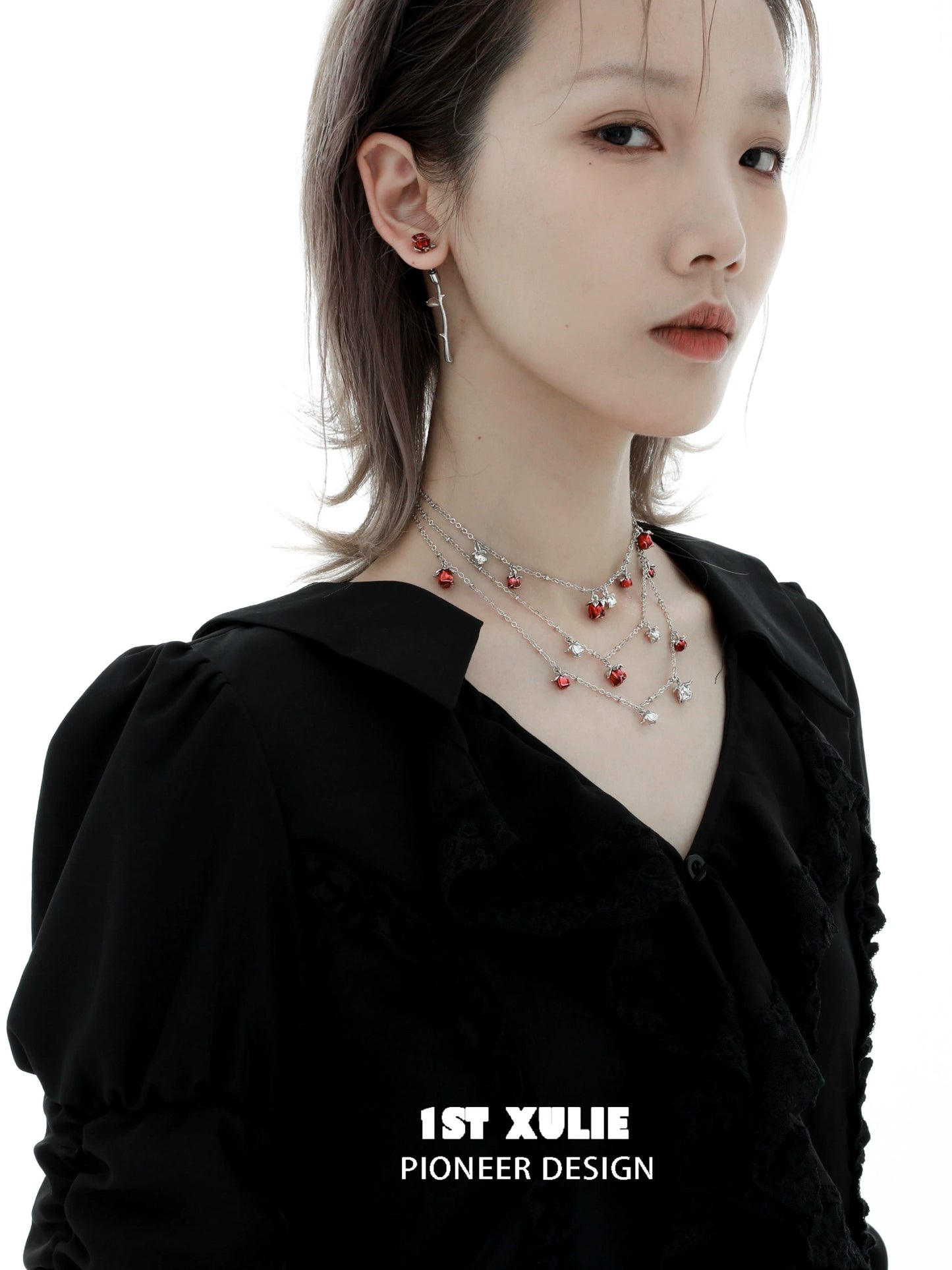 Stylish model wearing a rose kiss clavicle chain necklace with elegant design and colorful accents