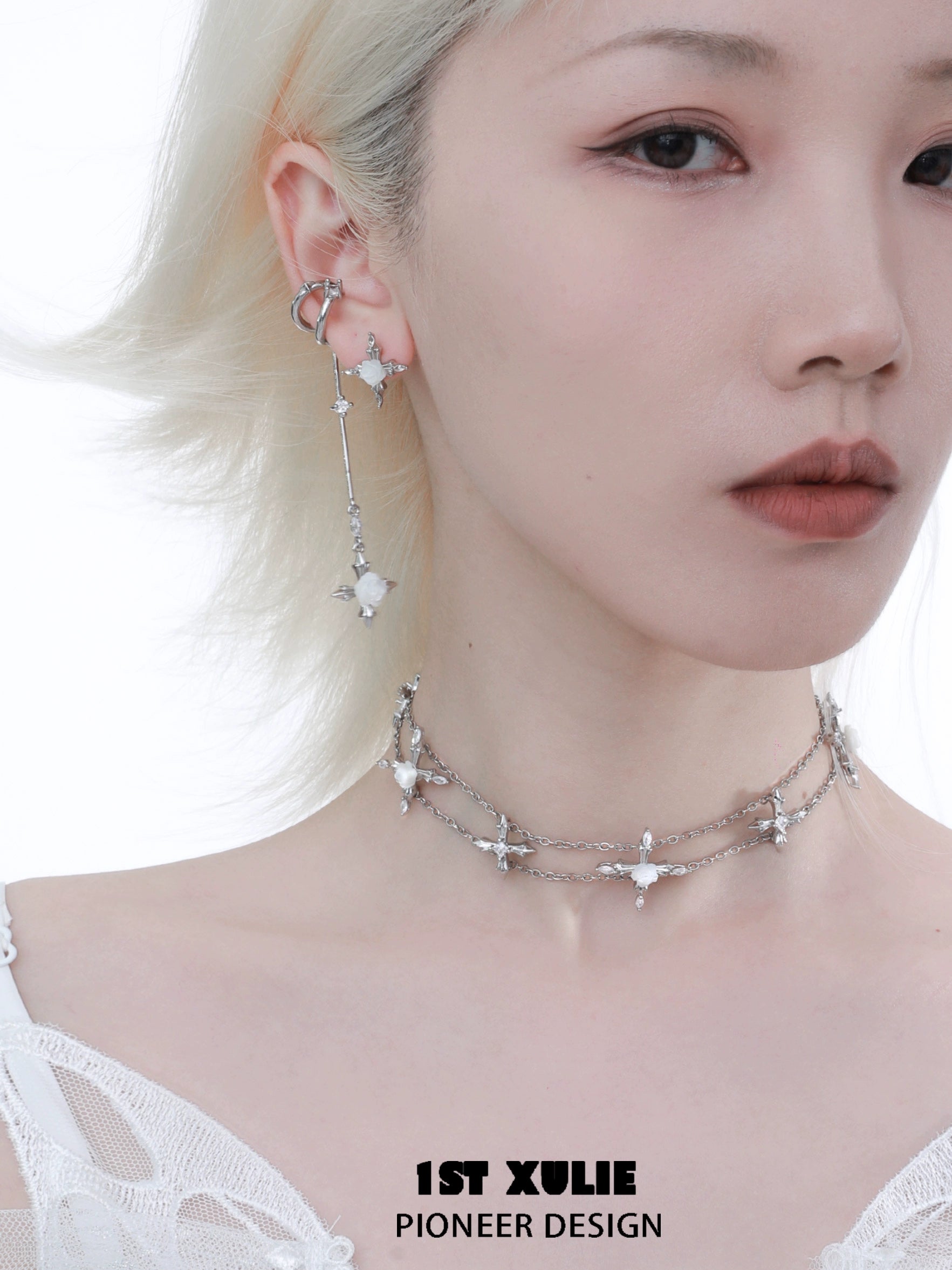 Elegant rose tassel earrings designed by 1ST XULIE featuring a unique star motif