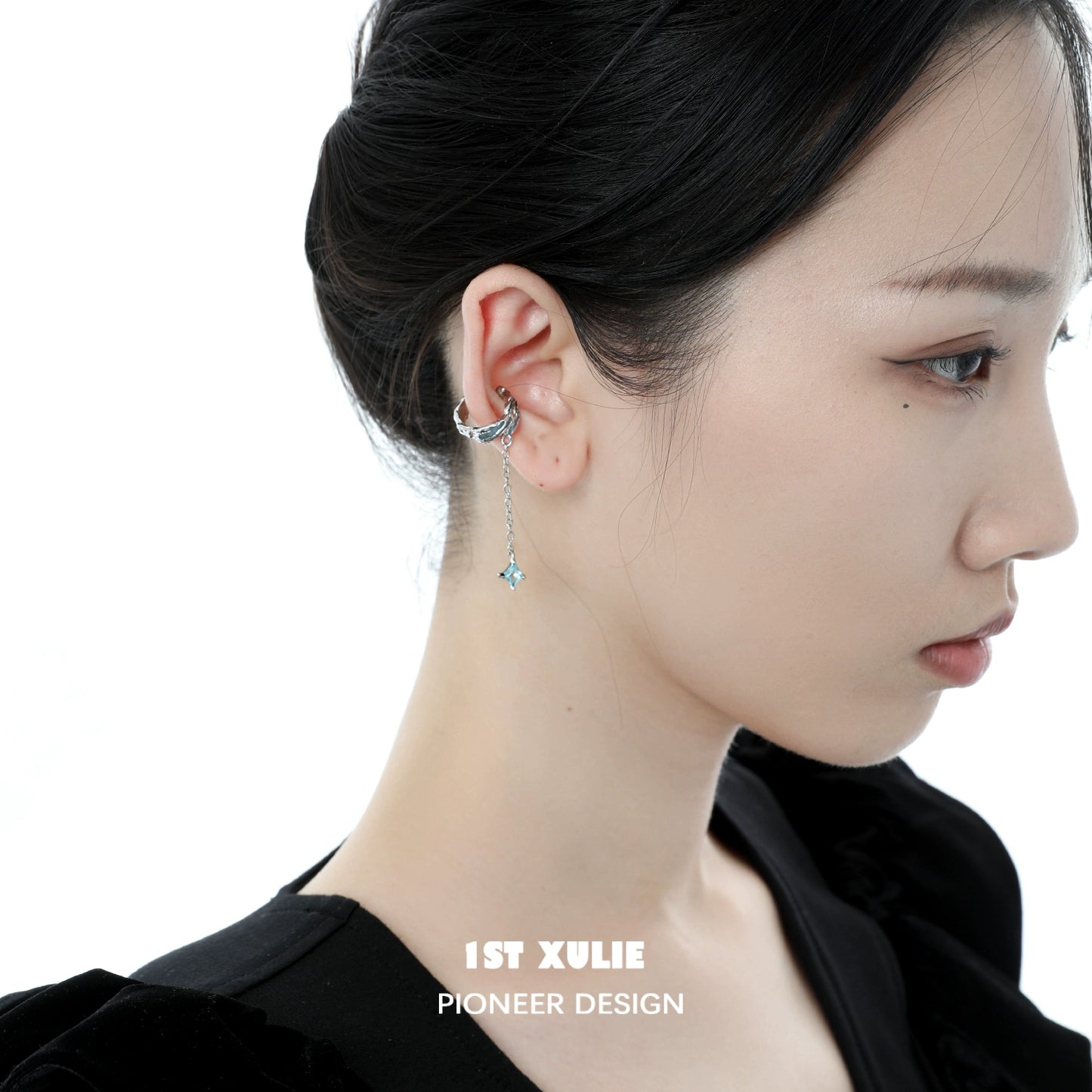 Elegant sea breeze star ear clip design in a woman's ear, showcasing its unique charm