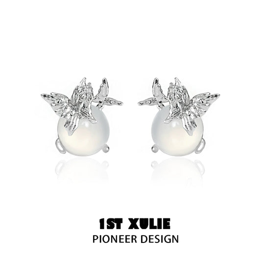 Elegant silver butterfly stud earrings featuring a pearl design for a chic look