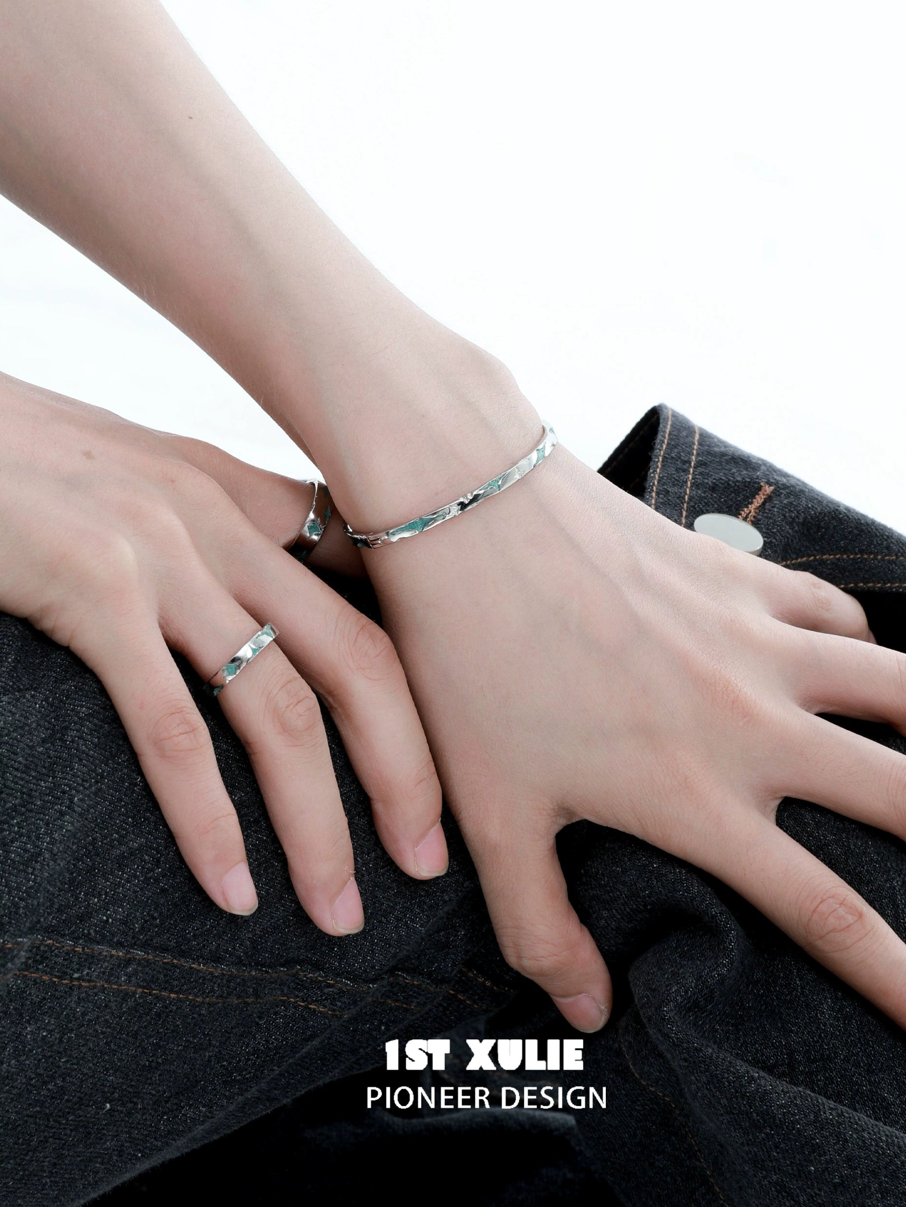 Elegant 1ST XULIE silver starlight bracelet on a wrist, showcasing unique design and modern style