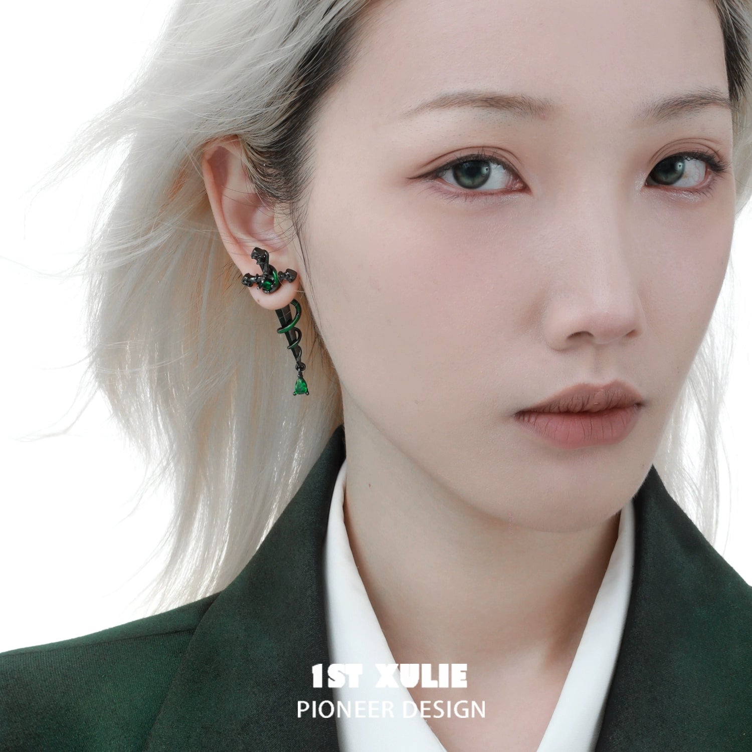 Slytherin inspired cross earrings showcasing green and silver design, perfect for fans of the house.