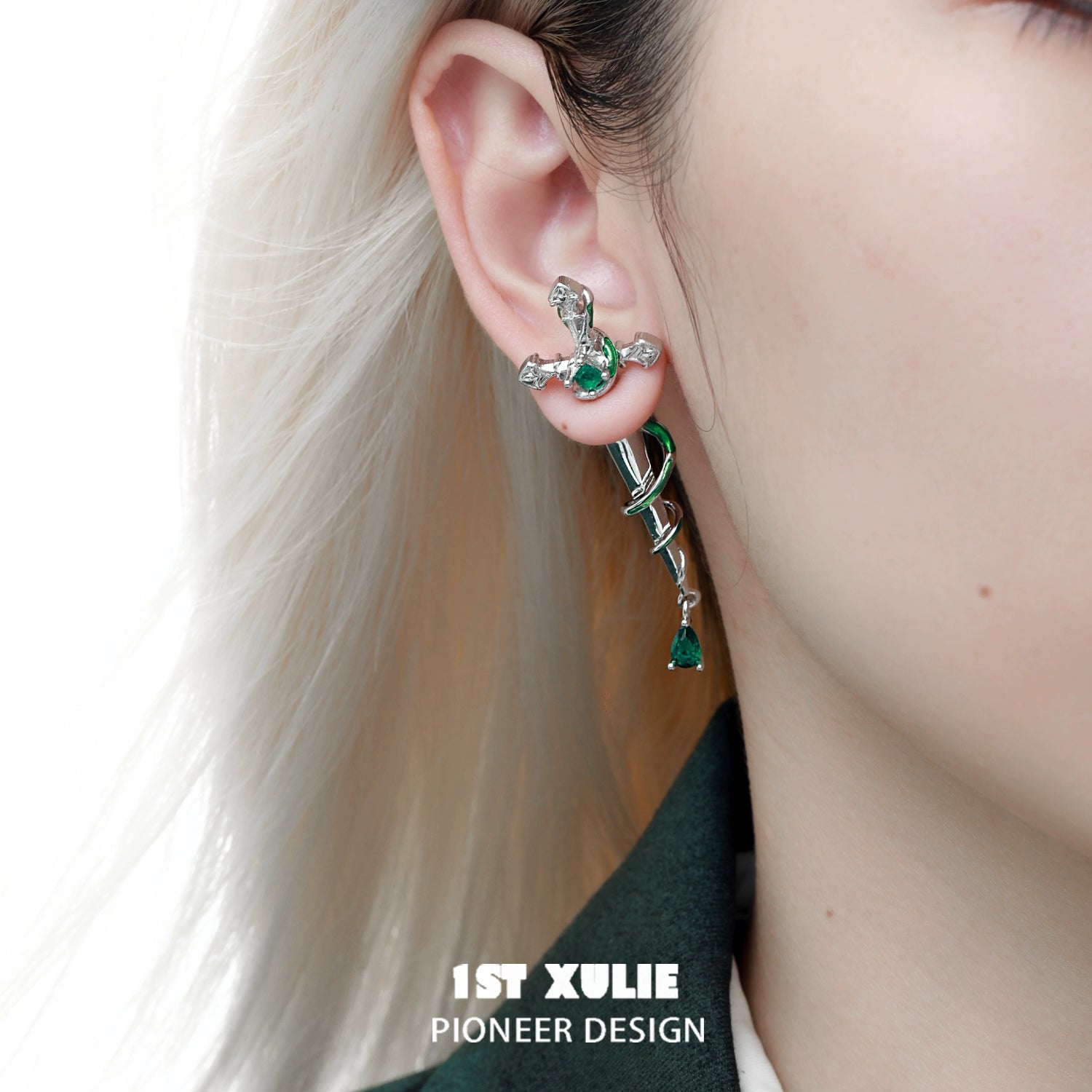 Slytherin inspired cross earrings with green gemstones, perfect for fans of the Slytherin house