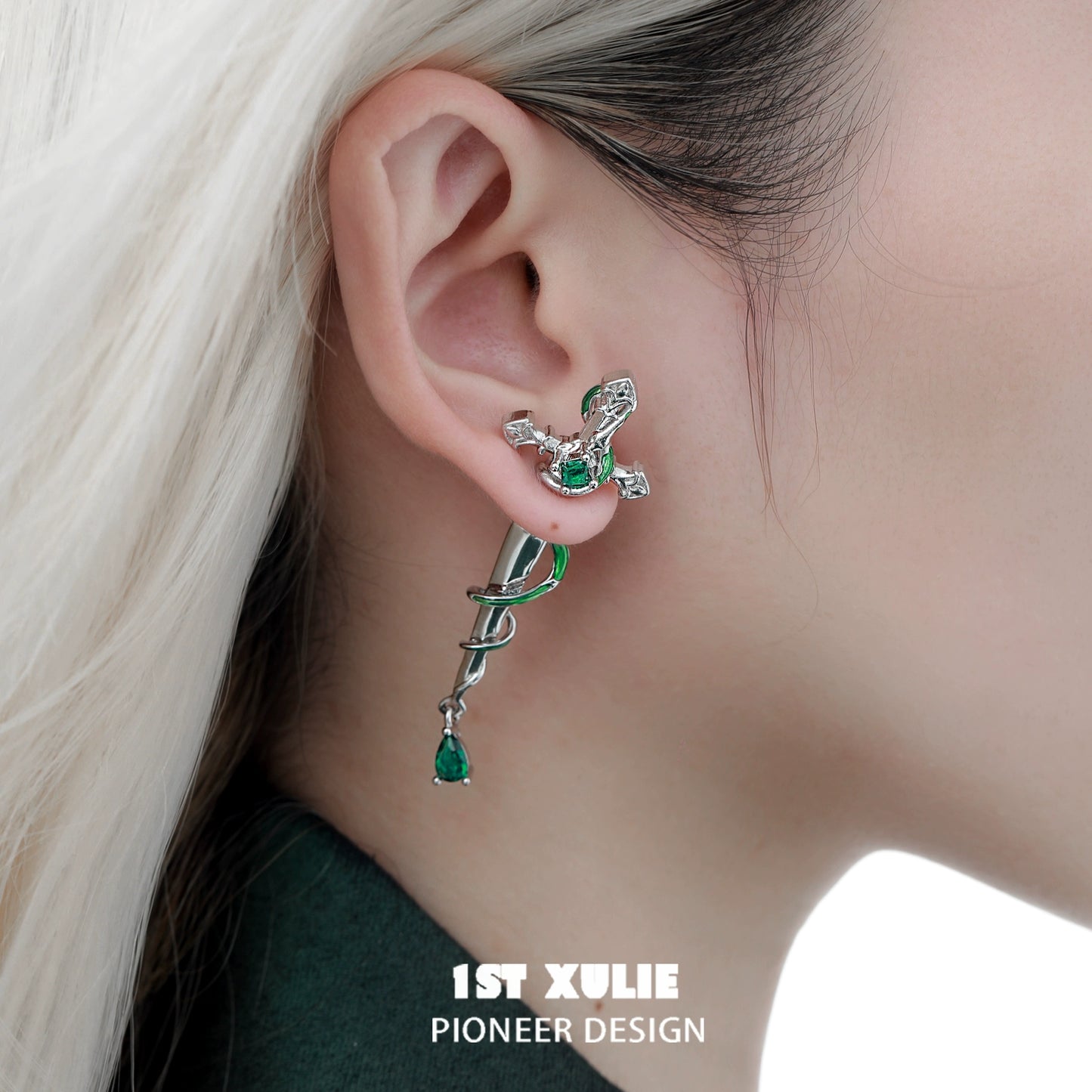 Slytherin inspired cross earrings featuring a serpent design with green accents