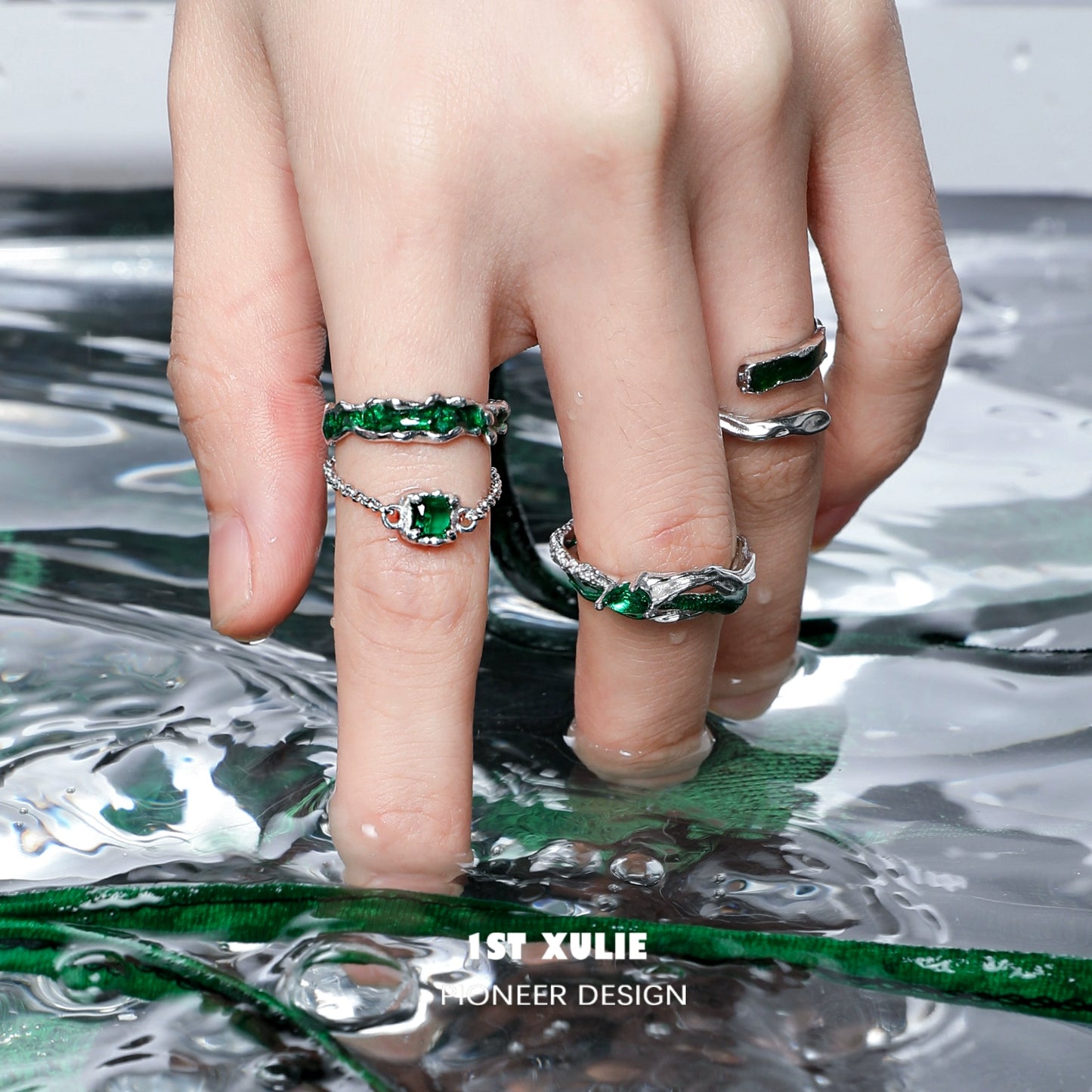 Slytherin inspired green snake ring with intricate design and sparkling green stones on a hand