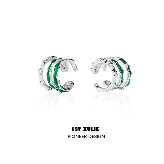 Slytherin snake ear cuff in silver and green for a stylish wizarding accessory