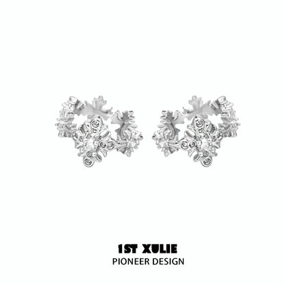 Stylish spiked cross earrings in silver, perfect for edgy fashion statements and versatile wear