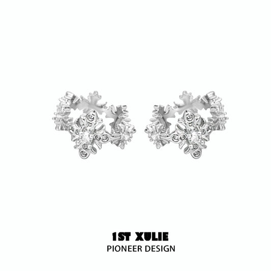 Stylish spiked cross earrings in silver, perfect for edgy fashion statements and versatile wear