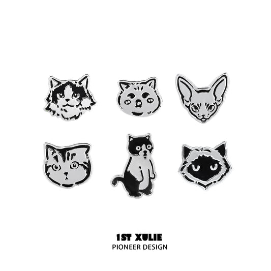 Set of street art cat earrings featuring six unique cat designs in a stylish silver finish