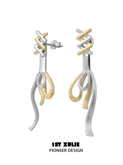 Twisted bow earrings in silver and gold with a modern design by 1ST XULIE