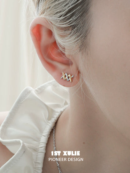 Elegant twisted bow earrings in gold from 1STXULIE, perfect for adding a unique touch to any outfit