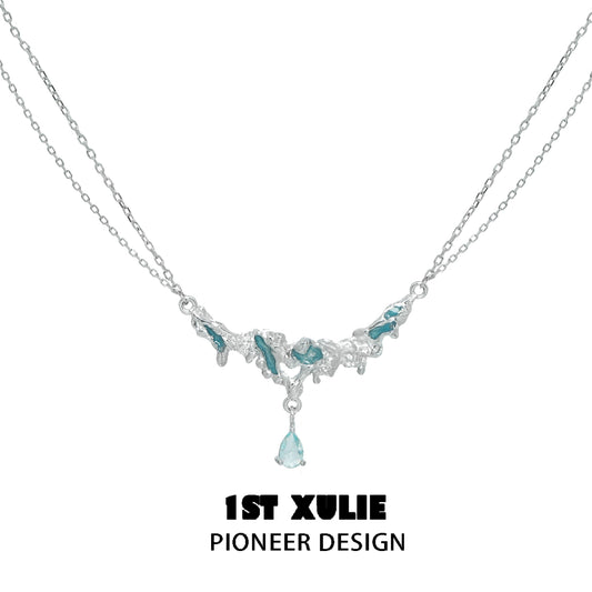 Unique silver sea necklace with intricate design and blue accents for a stylish look