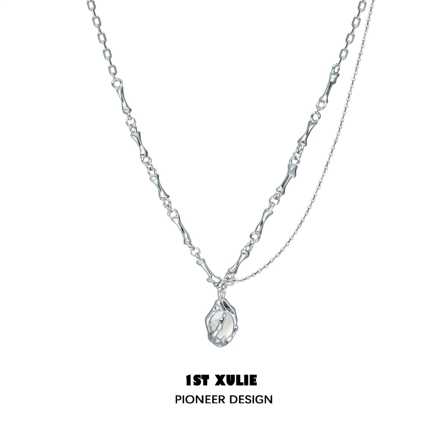 1ST XULIE unique summer pendant necklace in silver with a delicate, artistic design