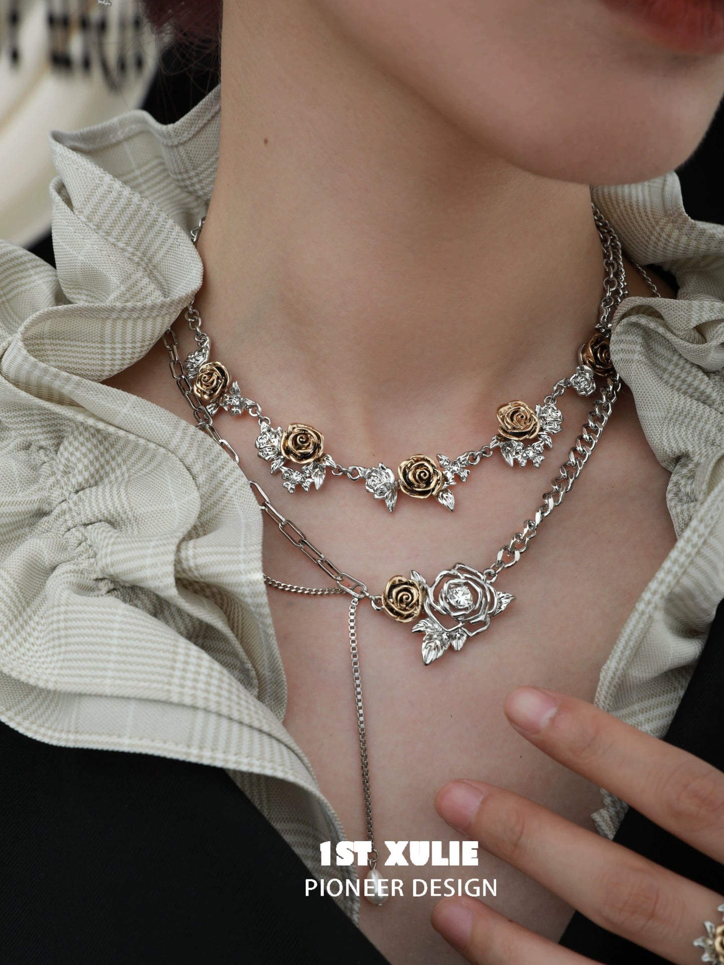 Elegant vintage rose necklace featuring silver and gold roses on a layered design