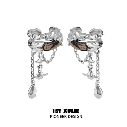 Wasteland ear cuff earrings by 1STXULIE with a unique design featuring chains and metallic details