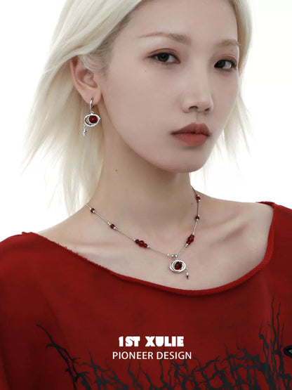 Elegantly styled model wearing a Y2K beaded necklace paired with matching earrings