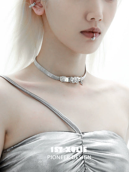 Stylish model wearing a Y2K belt buckle choker paired with a silver dress for a trendy look