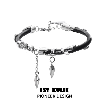 Y2K black chain leather bracelet with silver accents and decorative spikes for a stylish look