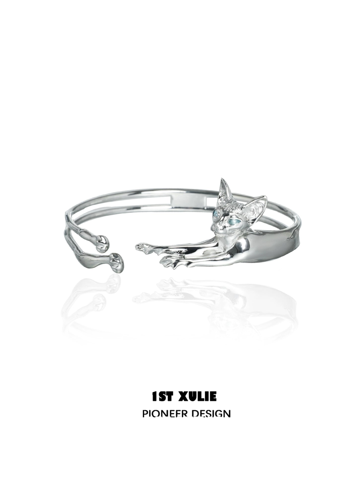 Silver Y2K cat bracelet featuring a playful cat design with blue gemstones for a trendy look