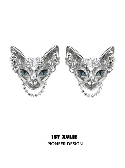 Y2K cat chain earrings in silver with intricate cat face design and blue eyes