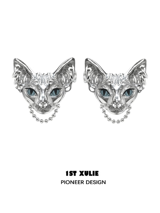 Y2K cat chain earrings in silver with intricate cat face design and blue eyes