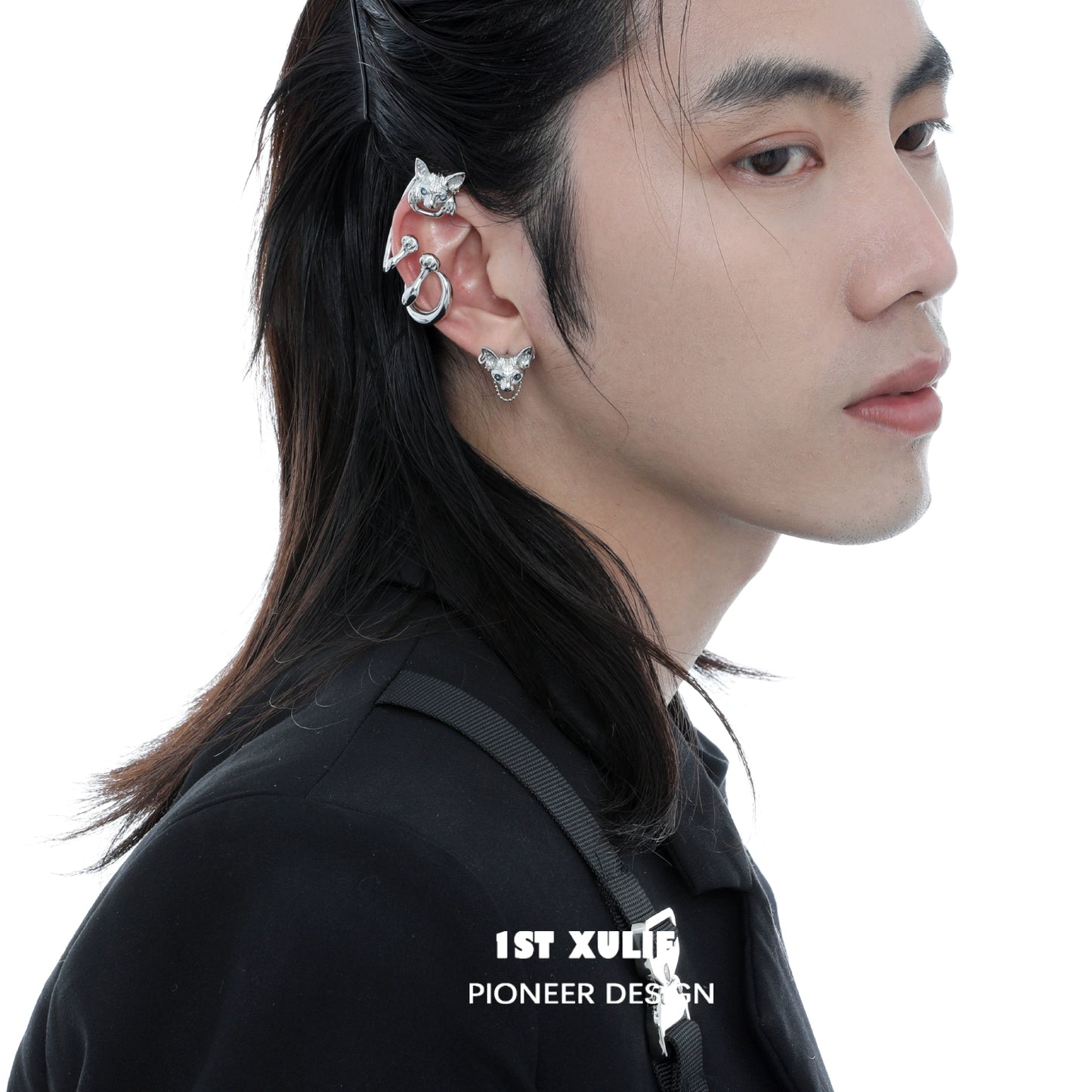 Y2K cat ear cuff in silver design worn by a model with long hair and stylish attire