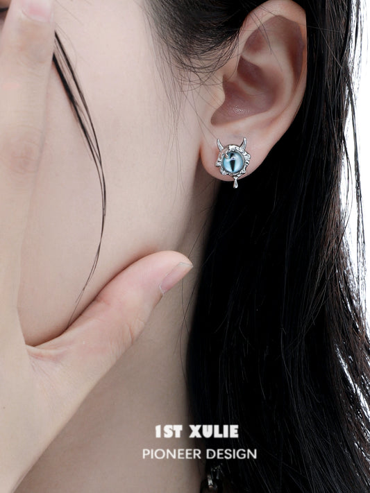 Y2K demon eye earrings featuring unique design with devil horns and turquoise eye detail