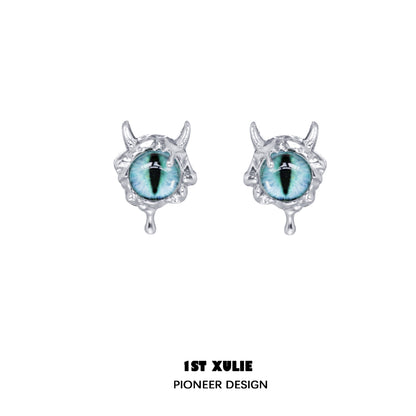 1ST XULIE Y2K demon eye earrings with a unique silver design and vibrant teal eye details