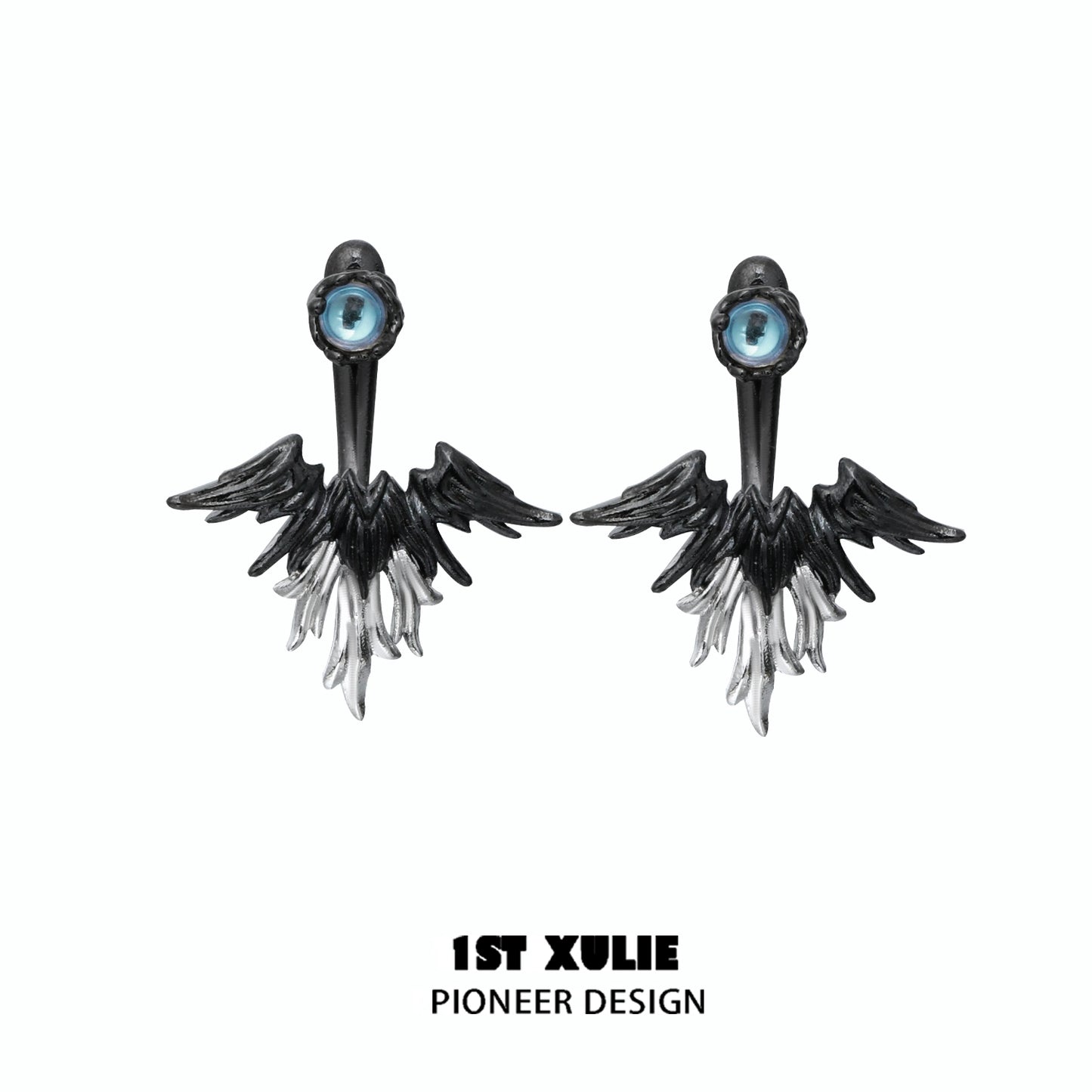 Y2K devil wing earrings featuring a striking black and white design with an eye detail