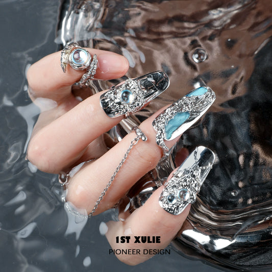 Y2K fairy nail chain ring on stylish nails with unique design and shimmering accents