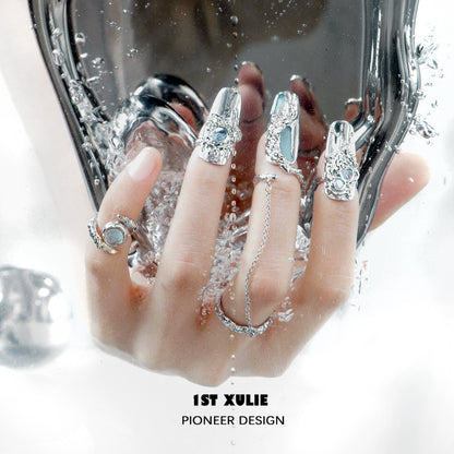 Chic Y2K fairy nail chain ring showcased on fingers with glittering details and unique design