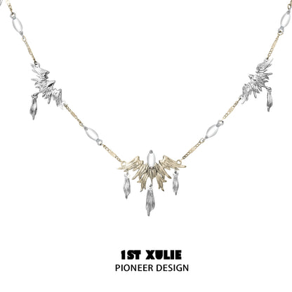 Y2K feather necklace in silver and gold with unique bird and feather pendants