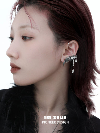 Y2K feather tassel earrings designed by 1ST XULIE, showcasing a unique and trendy look
