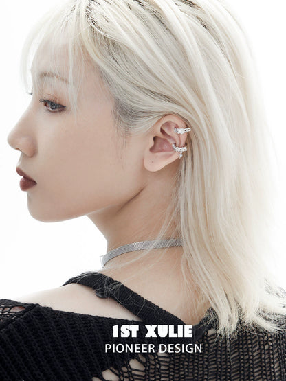 Stylish model wearing Y2K frozen breeze ear clips showcasing a unique design and modern aesthetic