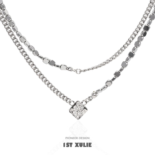 1ST XULIE Y2K galaxy necklace featuring layered silver chains with a sparkling pendant for a trendy look