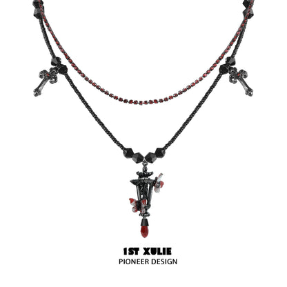 Y2K gothic butterfly necklace with layered chains and decorative elements in red and black