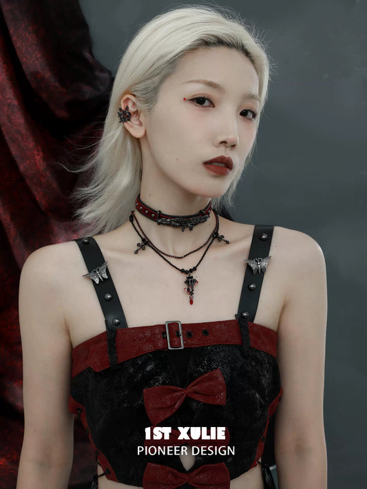 Y2K gothic butterfly necklace displayed on a model wearing gothic fashion with dark colors