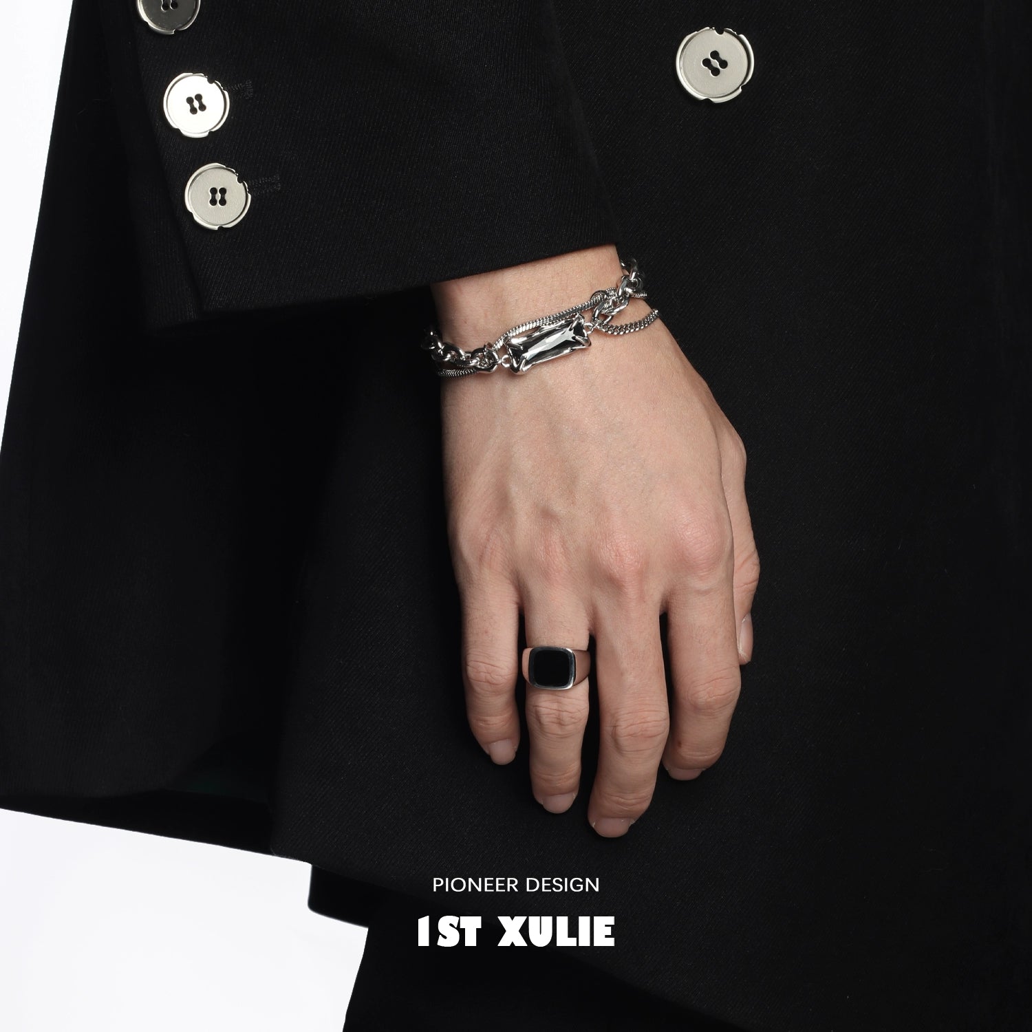 Y2K gray diamond punk bracelet showcased on a hand wearing a stylish black jacket