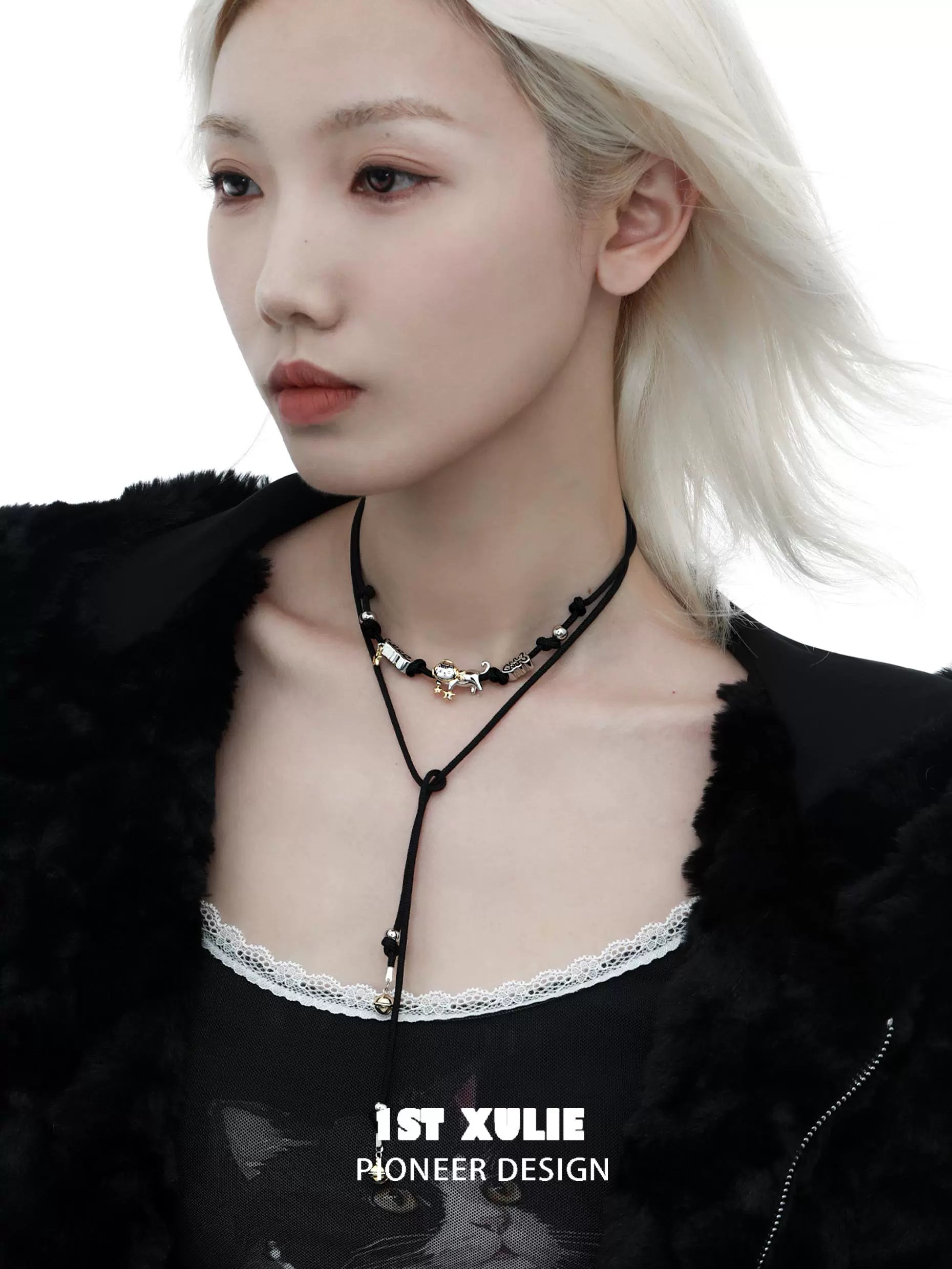 Model wearing a Y2K kitty leather necklace featuring playful charms and a trendy design