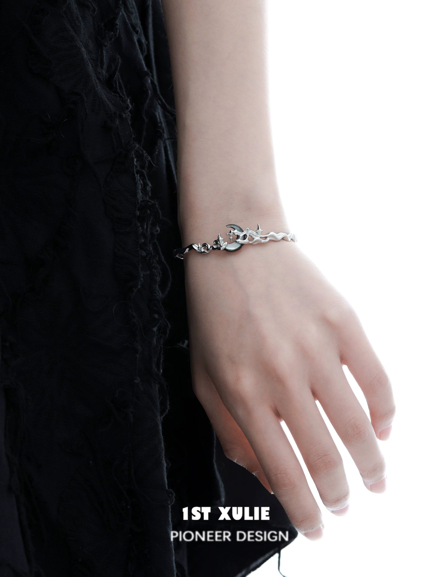 Stylish 1STXULIE Y2K moon orchid silver couple bracelet worn on a hand for modern accessory lovers