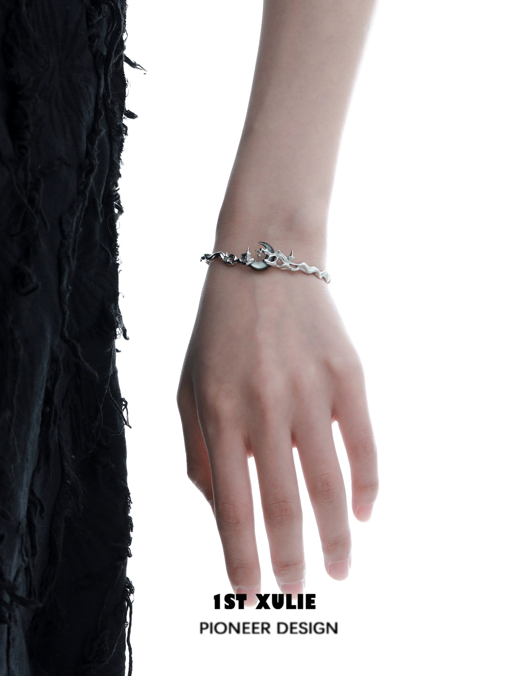 Y2K moon orchid silver couple bracelet on a model's hand showcasing its unique design