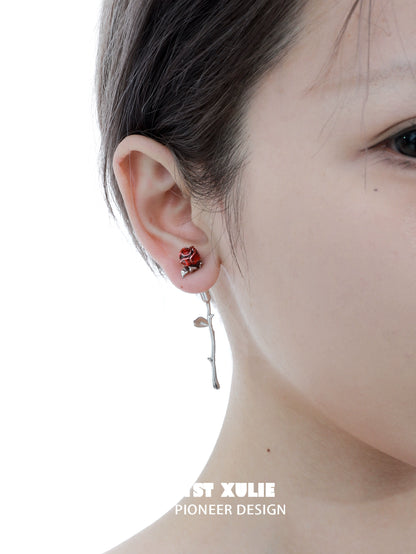 Y2K rose silver earrings featuring a delicate rose design and a hanging stem for a trendy look