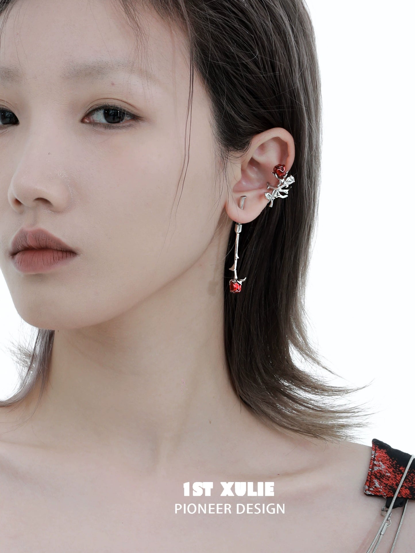 Model showcasing Y2K rose silver earrings with a floral design and stylish drop feature