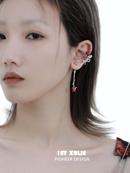 Model showcasing Y2K rose silver earrings with a floral design and stylish drop feature